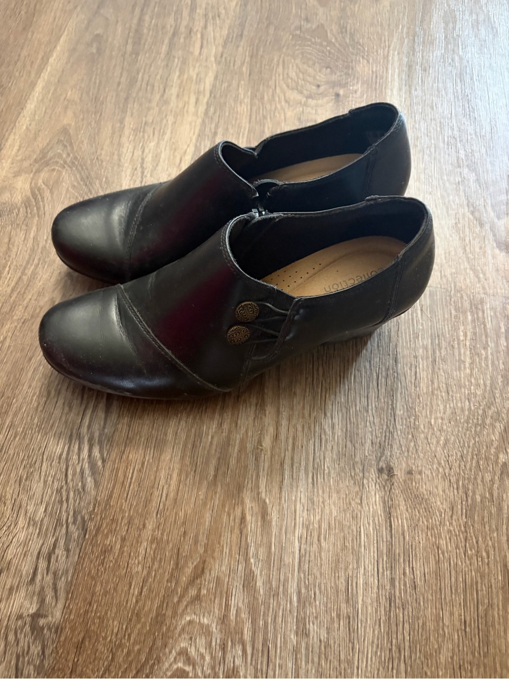 Clarks Women's Black Leather Ankle Booties with Decorative Buttons